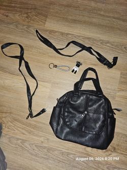 New women's purse , black in color