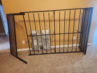 Full Size black metal bed frame with wood panels