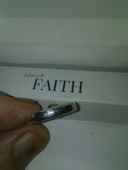 Has writeing on ring sterling silver