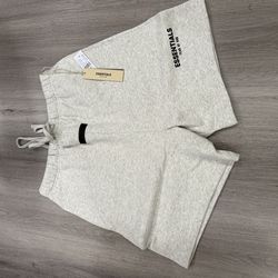Essentials light oatmeal shorts size: L
