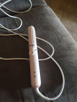 Lange like new curling iron