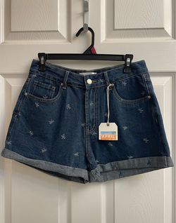 Brand new dark wash denim shorts with bow print size 9 Juniors