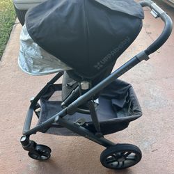 Uppababy Stroller. **Rubber Came Off One Wheel**