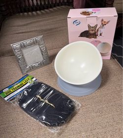 New adjustable pet food bowl , new 20 foot leash and picture frame