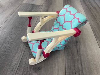Doll chair attaches to table