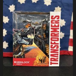 Transformers Age of Extinction Generations Leader Class Grimlock action figure.