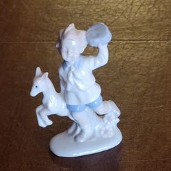 Vintage Lego Japan Boy & Dog Figurine Fine Porcelain Pastels High Gloss 
1970s. Pre-owned, very good shape, no chips or cracks. Display item.  
Weight