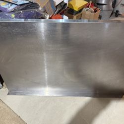 Stainless work Table by Sani Safe.