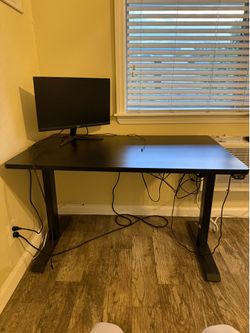 Large black standing desk