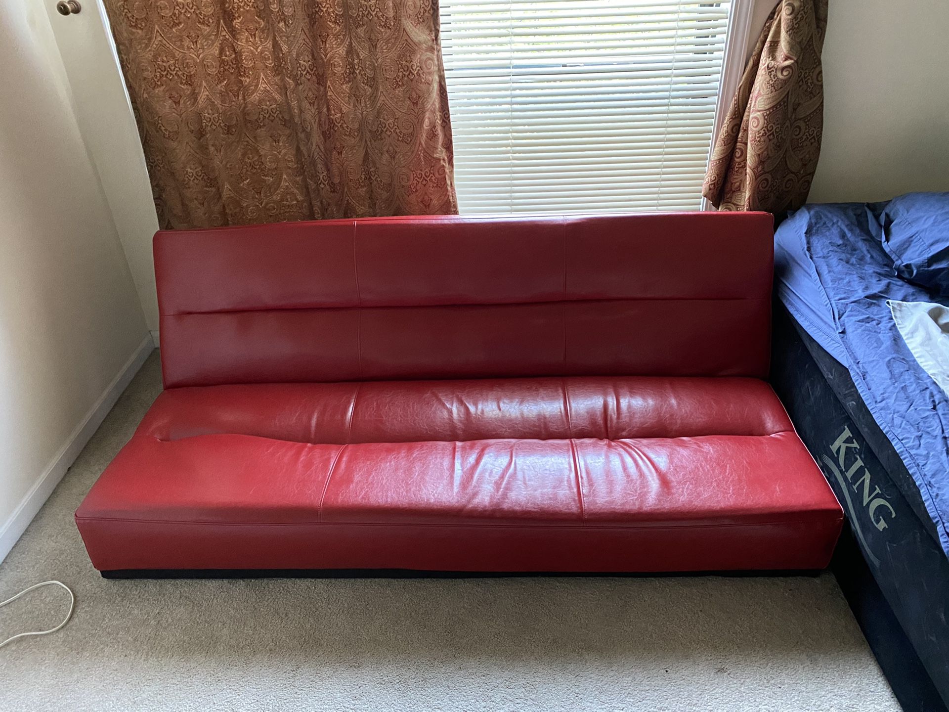 Red leather couch / Futon
