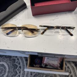2 Pair Of Cartier Glass. One New And One Used