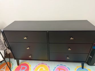 Black dresser with Gold Knobs