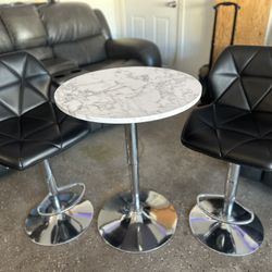 Marble Bar Table and Black Chairs