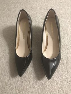 New black pumps size 7