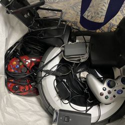 PlayStation 2 With Controllers And Roomba Vacuum
