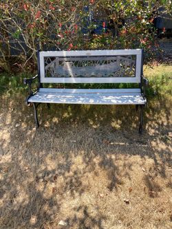 Cast Iron and vintage wooden park bench.