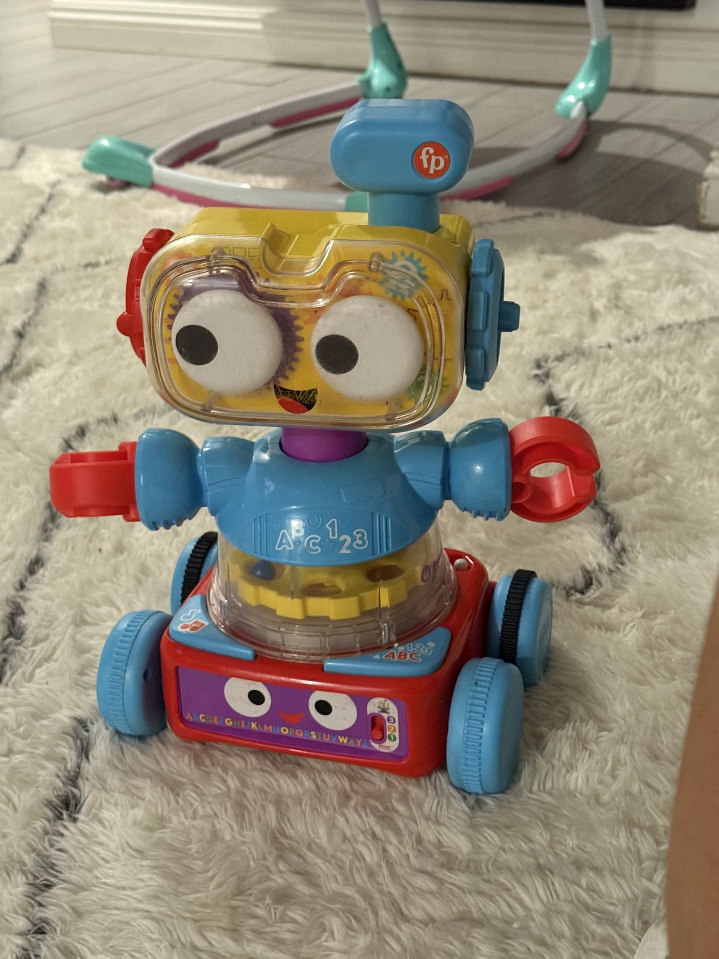 Fisher-Price 4-in-1 Learning Bot Interactive Toy Robot for Infants Toddlers and Preschool Kids