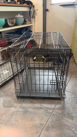 2 small/medium sized dog crates.