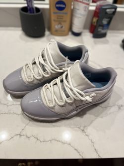 Jordan 11 low cement grey 