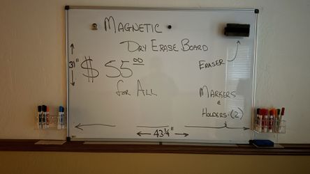 Magnetic dry erase board with markers and erasers