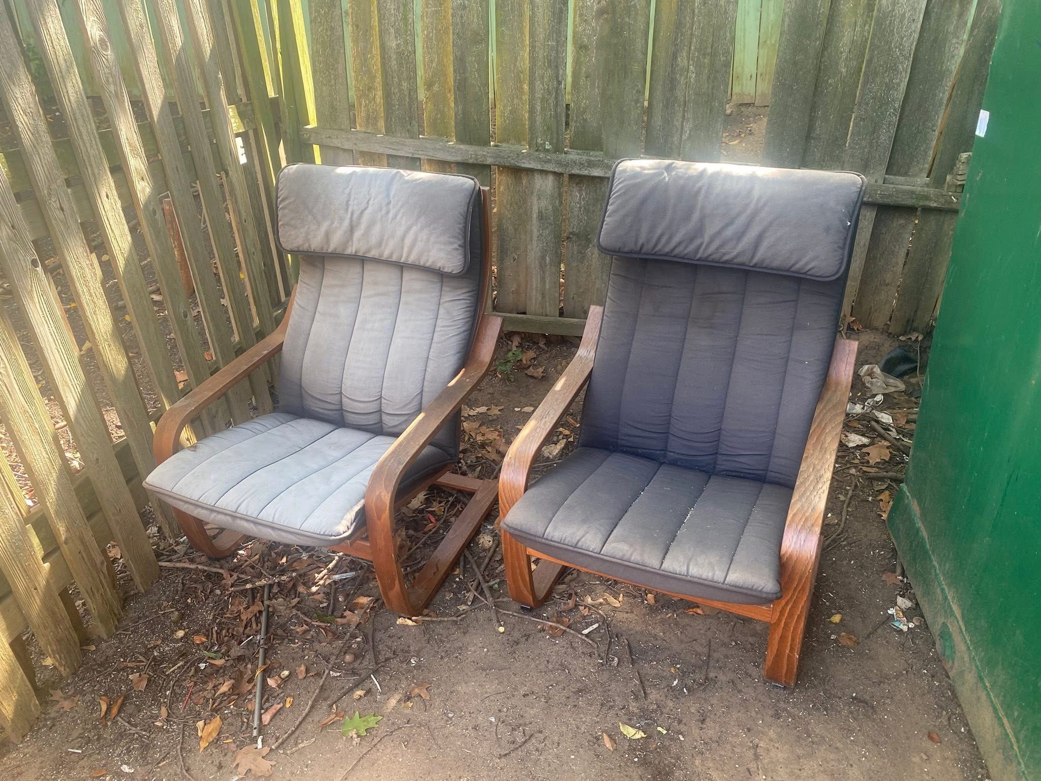 FREE! Set of 2 IKEA POÄNG Chairs They are faded and appear to have been used outside. Pick up available in Arlington VA by the Sheraton off of Colu
