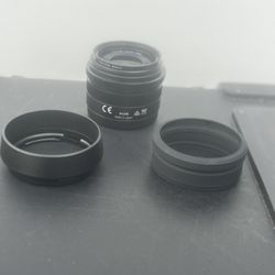 DJI D-L015 MFT ASPH 15mm Lens f1.7 Micro Drone Lens Excellent Condition. My apologies the pics do not do the lens justice. A lens cover broke on my ph