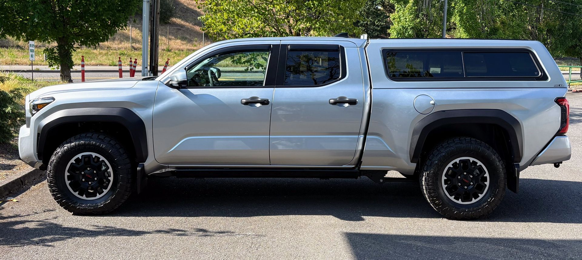 A. R.E. CX evolve Canopy For 2024-25 Tacoma Longbed