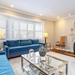 Two Jonathan Adler Velvet Sofas