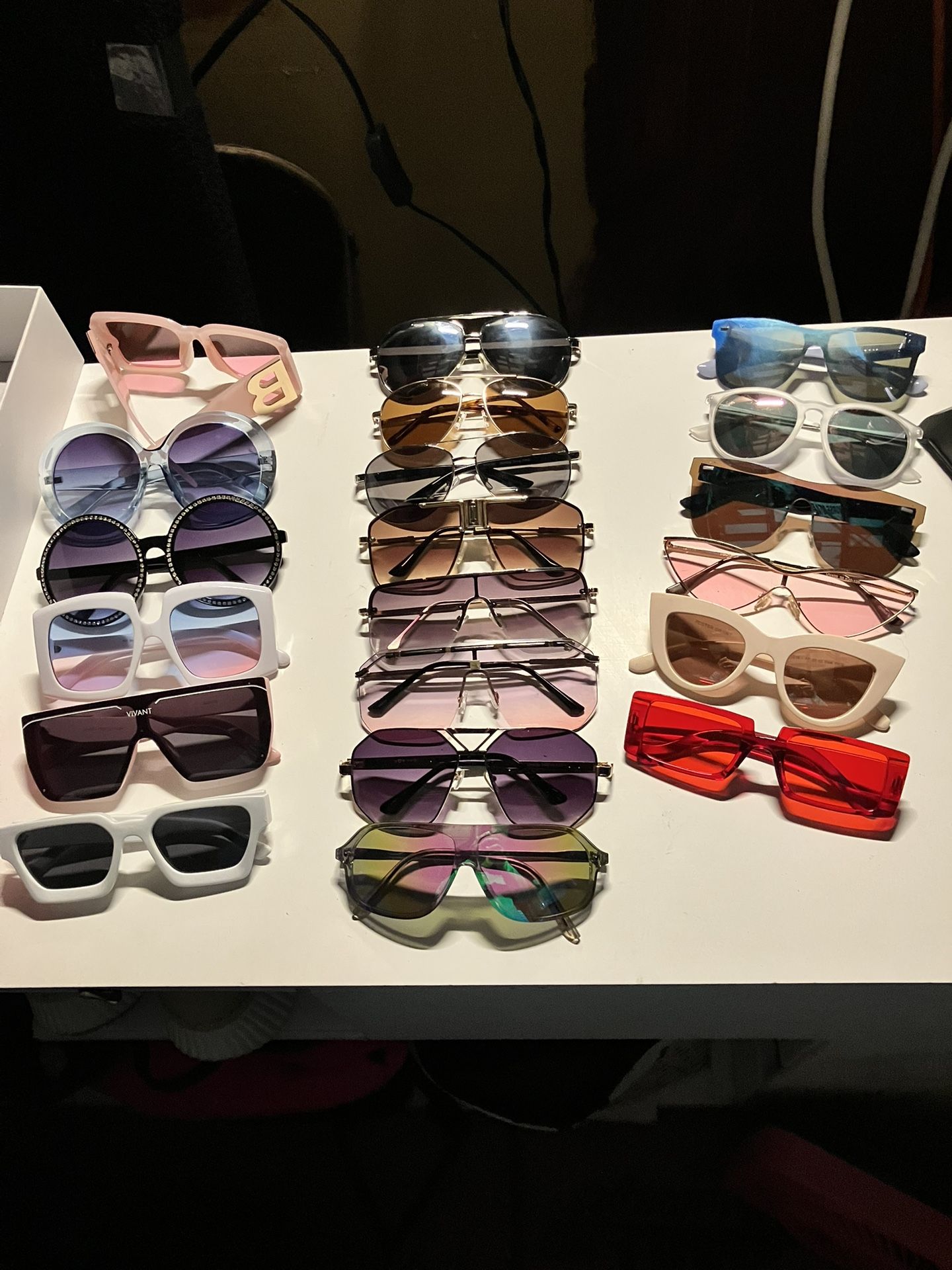 19 Pairs of Sunglasses