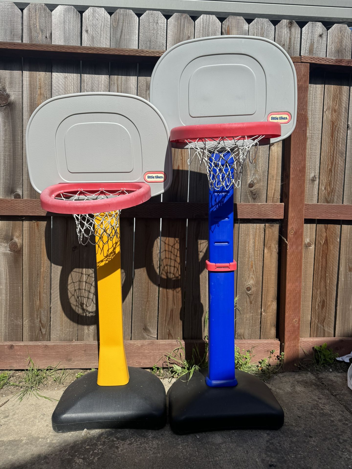 Two Little Tikes Basketball Hoop