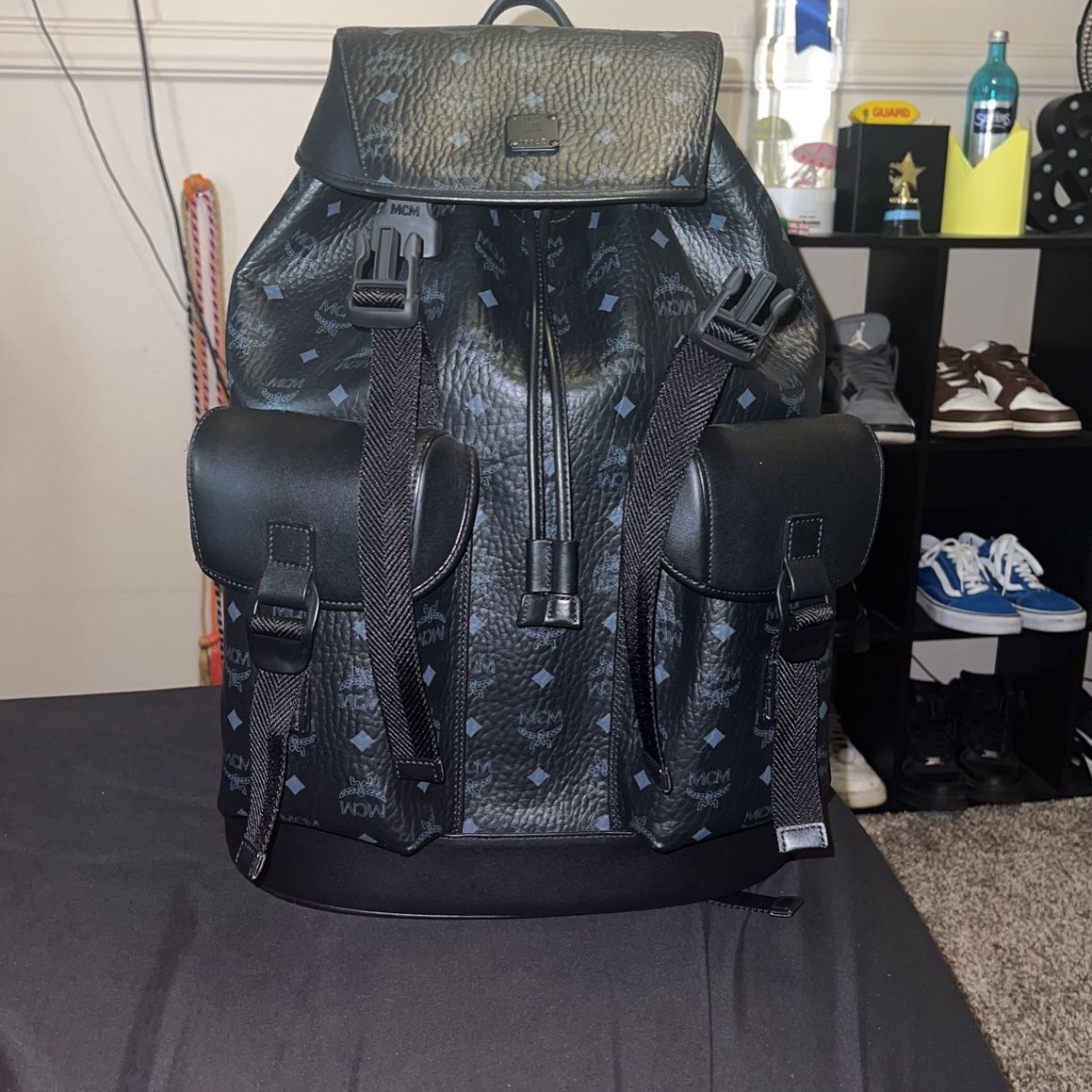 brandenburg backpack in monogram leather MCM Canvas Nappa Cubic Medium Black White 1832229 The hypnotic motif is proudly featured on the updated Brandenburg backpackan ultramodern take on the classic military style in nylon and nappa leather MCM Brandenburg Backpack in Visetos