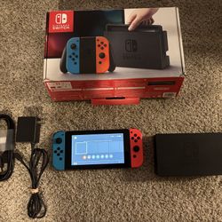 Unpatched Nintendo Switch V1 with original box, dock, cables, & 32 gb memory card