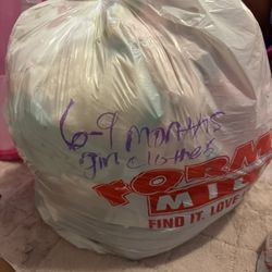 6-9 Month Clothes And Diapers