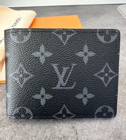 100% Authentic Louis Vuitton unisex like new both men and women wallet