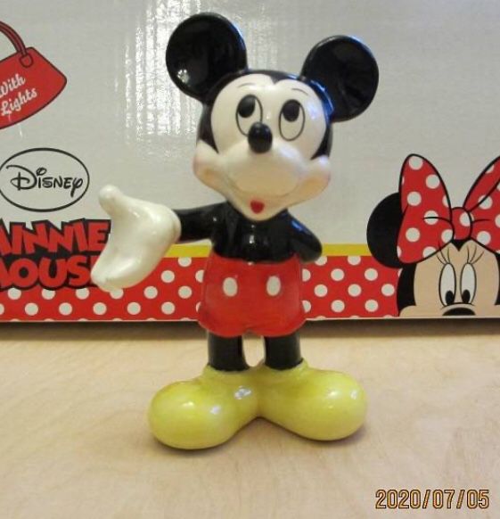 LOT of 13 Disney Minnie and Mickey Mouse Porcelain Figurines .The tallest one is 4 inches.