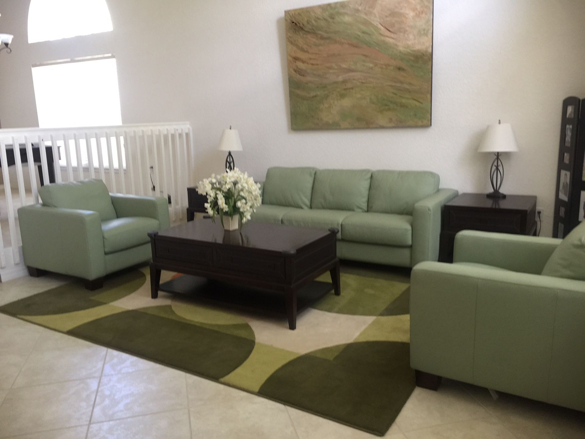 Like new leather couches mint green