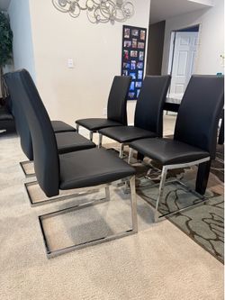 6 Dining table chairs ($50 each)