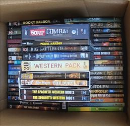 DVD movie collection for sale. Over 50 discs! Action, comedy, concerts, war movies, and westerns!