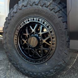 18x9 KMC RIMS AND TIRES 35/1250/18 TOYO MT