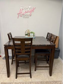 Square high top dining table with 4 chairs