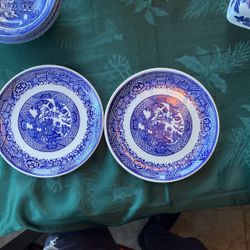 Two 7 inch diameter Blue Willow plates