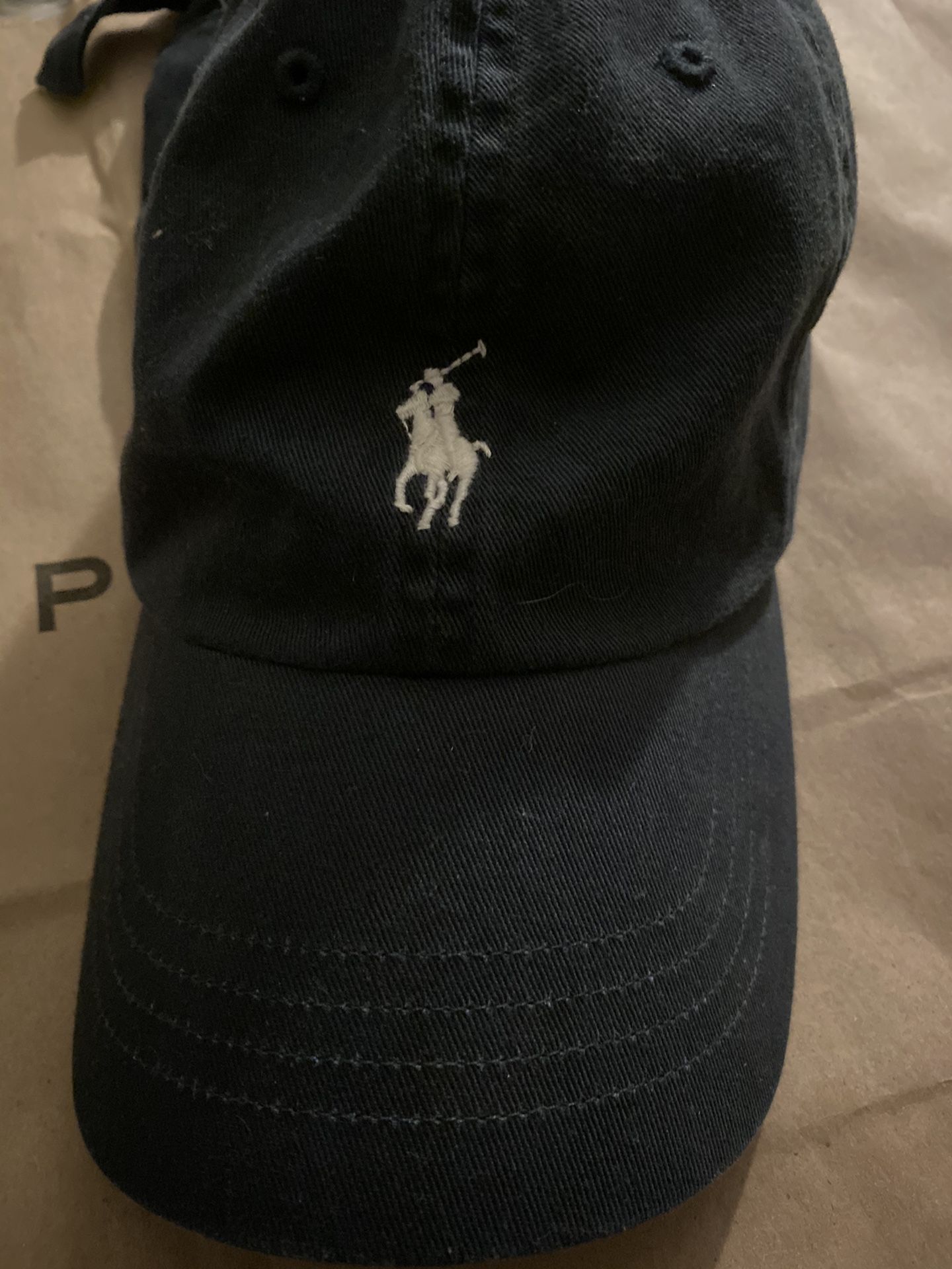 Black polo hat