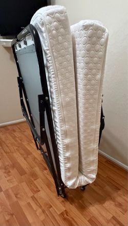 Roll away memory folding bed