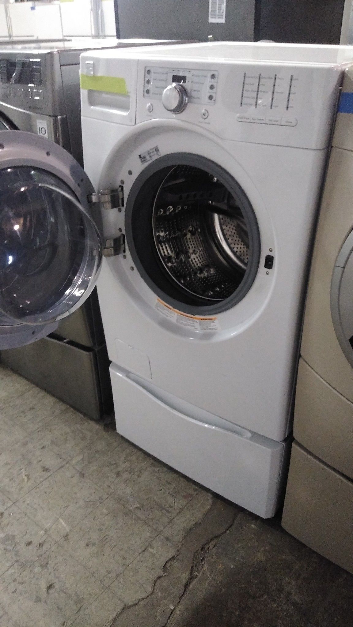 Kenmore front load washer with pedestal working perfectly with 4 months warranty