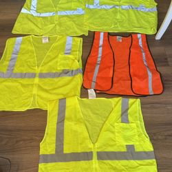 Five safety vest four of them are XL’s and One Is One Size Fits All