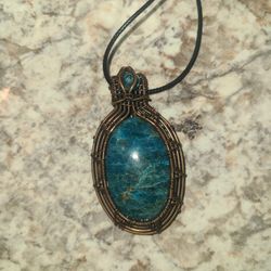 Neon Blue Apatite Gemstone Wrapped In Copper