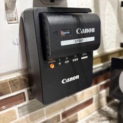 Canon LC-E6 Charger And LP-E6P Battery $150