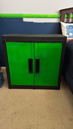 Green and Black Plastic Storage Cabinet