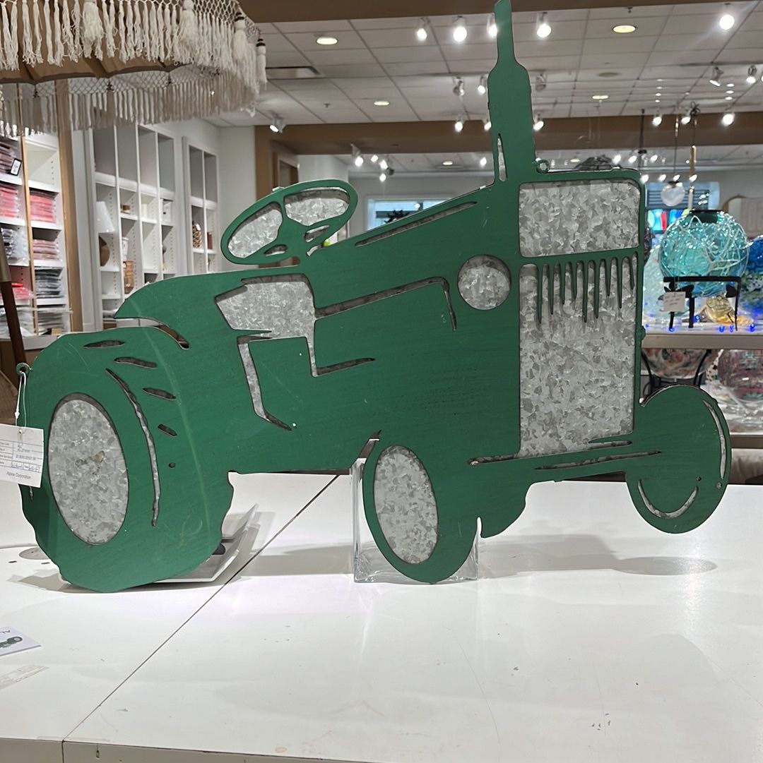 Metal Green Tractor Wall Decor. 27”L x 22”T.