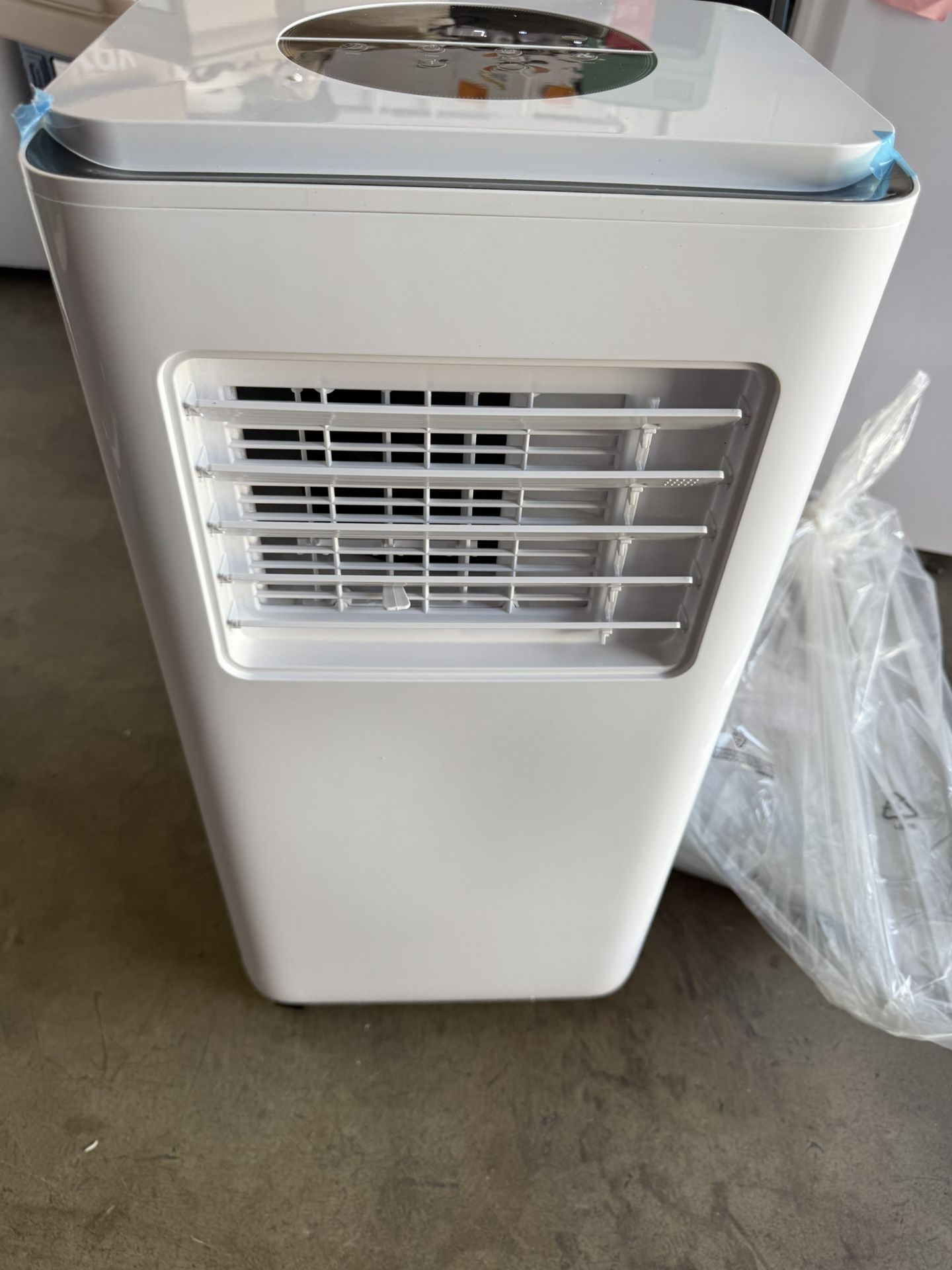 10,000 BTU (6,000 BTU DOE) 115-Volt Quiet 55 dB Portable Air Conditioner Dehumidifier and Remote to 300 sq. ft. White